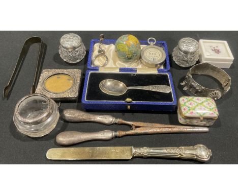 A pair of silver hafted glove stretchers; a 19th century French silver-gilt knife; dressing jars; a pair of George III Old Sh