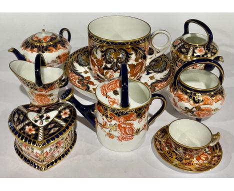 A Royal Crown Derby Imari pattern coffee cup and saucer, 9cm high overall, c. 1890; a heart shaped trinket bonbonniere and co