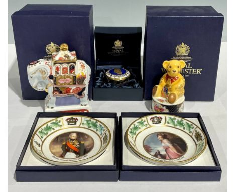 A Royal Worcester candle snuffer, Nelson Elephant, 12.5cm, boxed; another Teddy Bear, boxed; a Royal Worcester circular patch