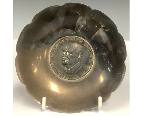 An Elizabeth II silver shaped circular dish, inset with medallion, inscribed 'RT:HON. SIR WINSTON CHURCHILL K.G. O.M. C.H. M.