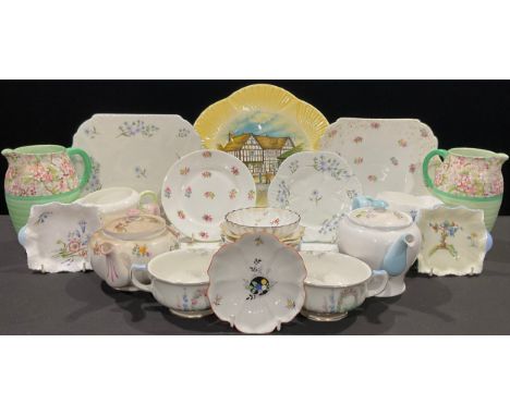 A Shelley Wild Flowers pattern three piece tea service, comprising teapot, cream jug and sugar basin; a Shelley Blue Rock par