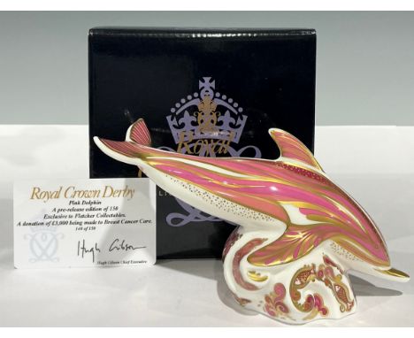 A Royal Crown Derby paperweight, Pink Dolphin, exclusive to Fletcher Collectables, limited edition 140/150, gold stopper, pin