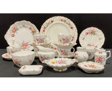 A Royal Crown Derby Posies pattern tea set for six, cups, saucers, tea plates, milk and sugar; a similar plate; others simila