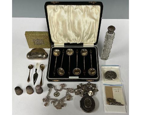 A late Victorian/Edwardian silver topped cut glass scent/salts bottle, London 1902, 11cm; a set of six George V silver coffee