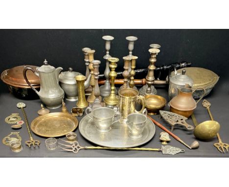 Metalware - a pair of 18th century style pewter ejector candlesticks, others brass, Arts and Crafts style hammered tea set on