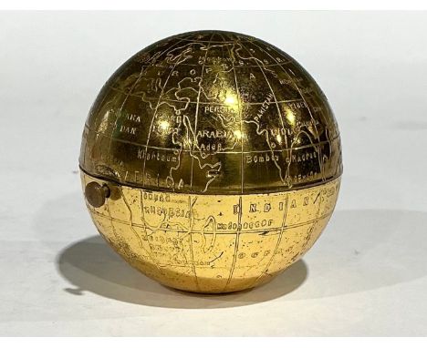 A mid-20th century brass Pygmalion spherical globe powder compact, hinged cover with mirror, complete with powder puff and me