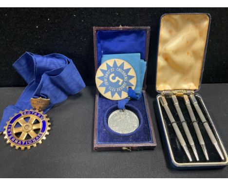 A silver-gilt and enamel Rotary International jewel, named to Stanley Wood, 1960-61, Toye &amp; Co, London 1960, 53g; a set o
