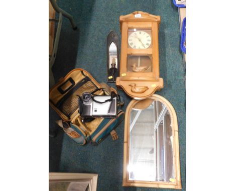 A pine cased wall clock, bamboo mirror, candle stand, arched mirror, and a camera carry bag. (a quantity)