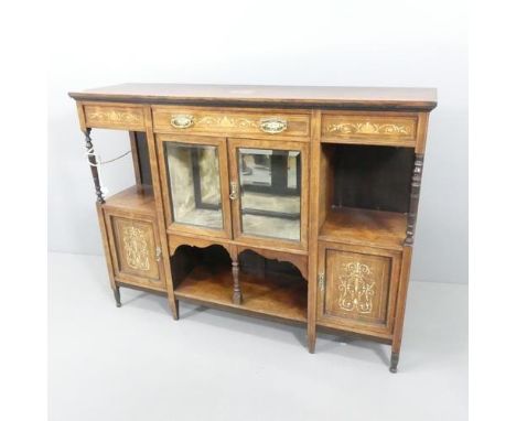 A Victorian rosewood and satinwood strung sideboard in the manner of Maple & Co., with inlaid ivory and satinwood decoration.