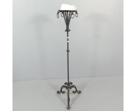 An antique wrought iron candle stick stand. H - 132cm. 