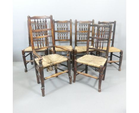 A matched set of six North Country style rush-seated dining chairs, with bobbin-turned backs. (5+1)All in used condition. Som