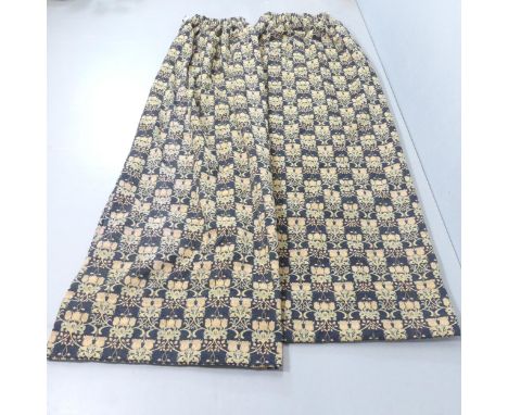 A pair brocade lined curtains with thistle design. Width (top) 110cm, (base) 170cm, Drop 250cm, and a mahogany curtain pole, 