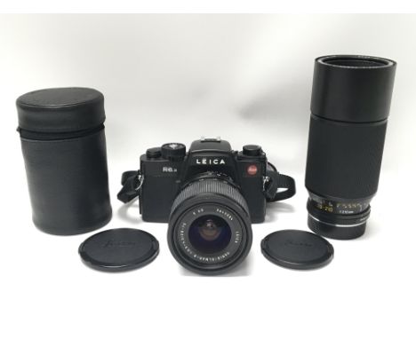 A Leica R6.2 35mm film camera body together with two E mount lenses - a Leica Vario-Elmer-R 28-70mm f3.5-4.5 and a Leica Vari