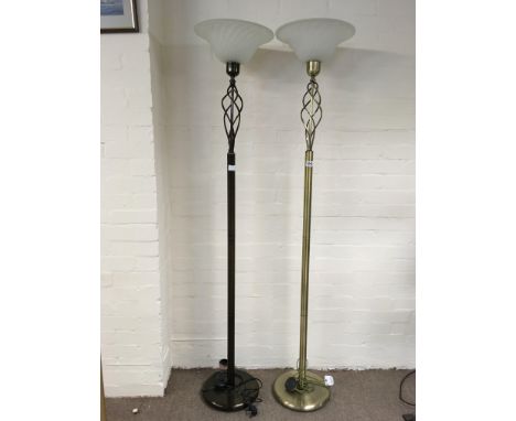 A collection of lights including standard lamps with with metal bases, pierced twist design to the top and glass shades, one 