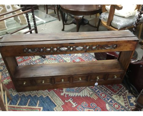 An 18th Century and later oak and stained pine wall shelf with six faux drawers, approx 61cm x 120cm x 21cm - NO RESERVE