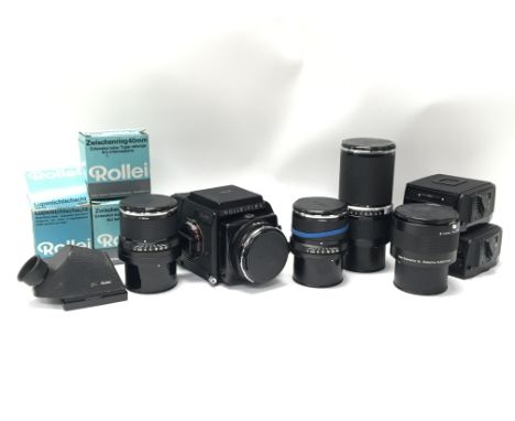 A Rolleiflex SL66SE medium format camera with lenses and accessories. Lenses consist of Rollei Distagon 50mm f4, Carl Zeiss S