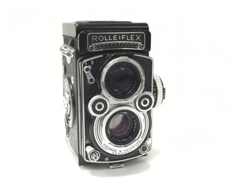 A cased Rolleiflex TLR camera with Carl Zeus Planar 75mm f3.5 lens