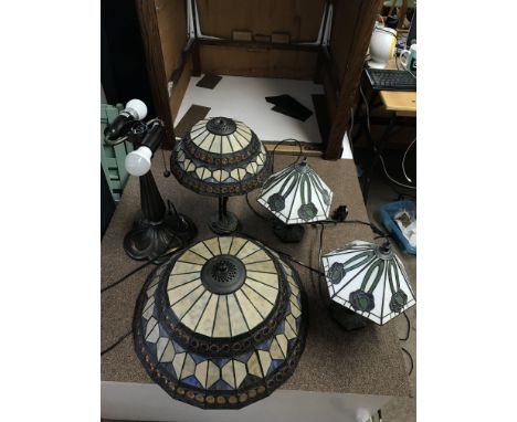 Four Tiffany style lamps, two pairs of matching designs. One with a lady on the stem of the lamp - NO RESERVE