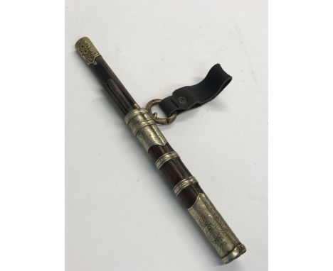 An unusual old Chinese travelling chop stick carrier. The wooden holder is decorated with a white metal with a Chinese symbol