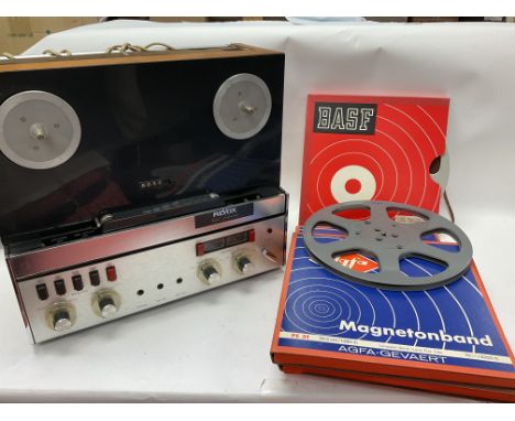 A professional tape recorder, the Revox A77. Complete with five 10.5 inch reels of tape plus take up spool, mains and output 