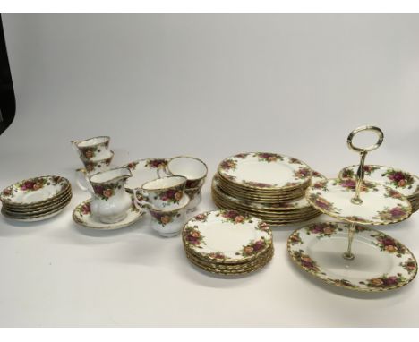 A Royal Albert China tea and dinner service Old English County Rose pattern first quality and no obvious damage. Six place se
