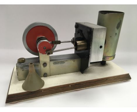 A model traction engine on wooden base