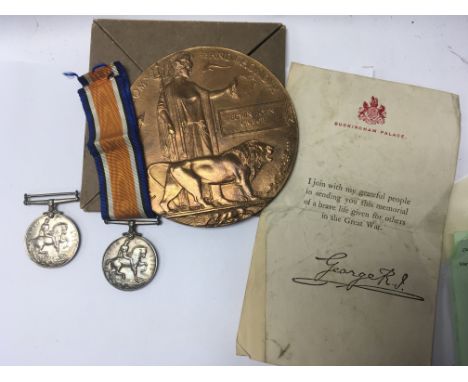 A I world war memorial plaque awarded to Edwin John Craigie and two medals awarded to K.41795 E. D Impey S.T.O .1 R.N and the