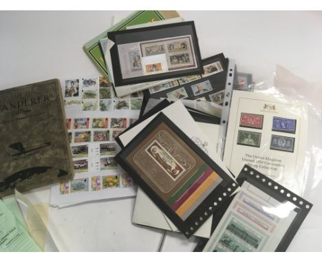 A good collection of British commonwealth commemorative stamp packs and unused stamps. (a lot)