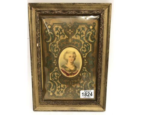 A gilt framed plaque depicting Marie Antoinette on an oval porcelain plaque with mother of Pearl inlay. 28cm x 20cm including