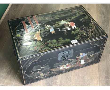 A Chinese lacquer storage trunk. 58cm x 28cm x 38cm approx