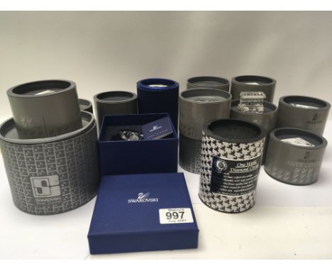 A collection of boxed Swarovski Crystal glass ornaments including a train set. No obvious damage item with detached parts (a 