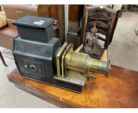 A Husband’s &amp; Sons Magic lantern (Electric lamp fitting).