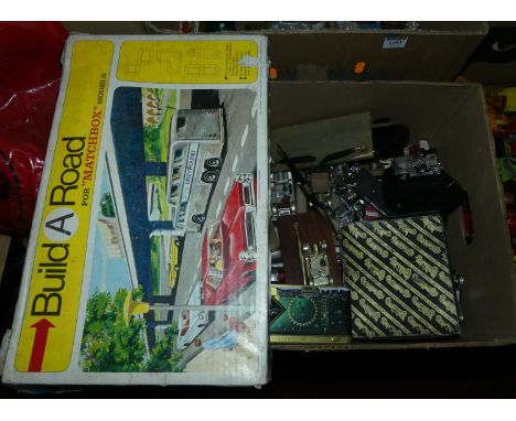 A tray of mainly Matchbox souvenir and ashtray collectables and an incomplete Matchbox Build-A-Road gift set