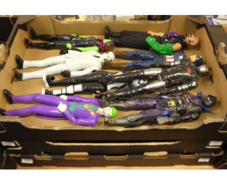 Three trays of DC and Marvel related action figures and a quantity of Action Man related examples to include The Joker