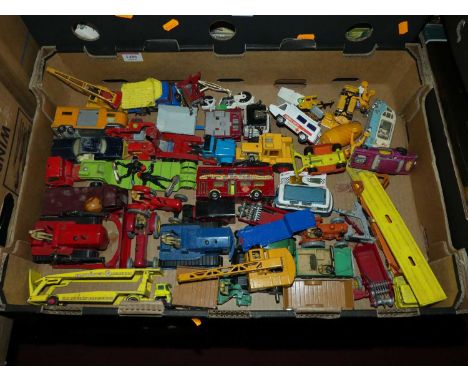 A tray of various playworn Matchbox, Corgi and Dinky Toy diecasts to include a Dinky Toy Blue Heavy Tractor, etc