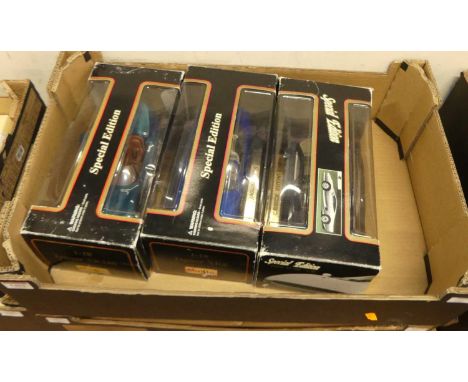 One tray containing six various boxed Burago and Maisto 1/18 scale diecasts to include a Jaguar XK180