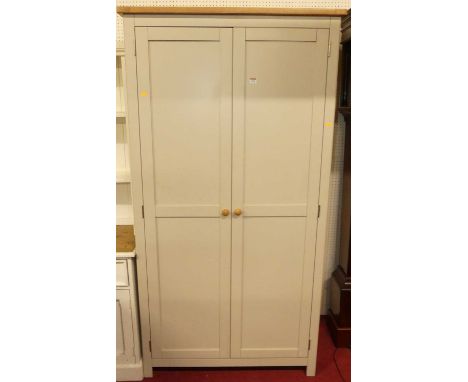 A modern painted and blond oak double door wardrobe, w.100cm 