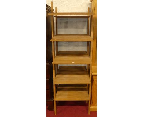 A pair of contemporary blond oak five-tier standing shelf units, h.193cm, w.65cm