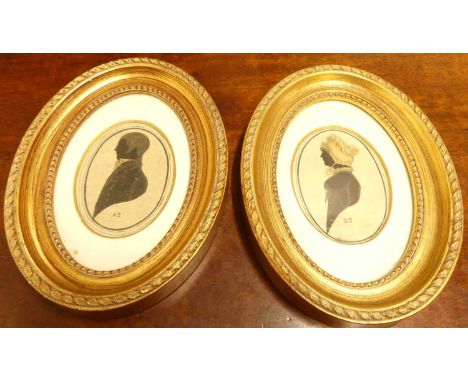 A pair of George IV portrait silhouettes of Nathaniel Jones and his wife Mary Adams, each numbered and with later labels vers