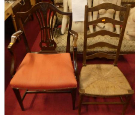 A George III mahogany elbow chair in the Hepplewhite style, together with an ash and rush seat ladder back chair (2)