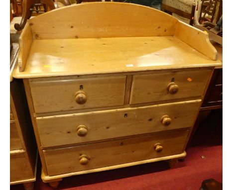 A Victorian pine chest, having a three-quarter gallery above two short and two long drawers, w.96cmColour is good.Some light 