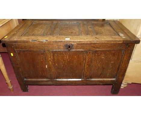 A circa 1700 joined oak three panel coffer, with replacement iron hinges, w.102cm