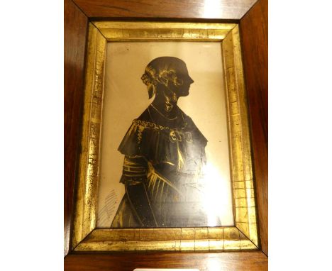 A mid 19th century portrait silhouette heightened with gilt, 11x7cm, together with two small oval portrait silhouettes, and a