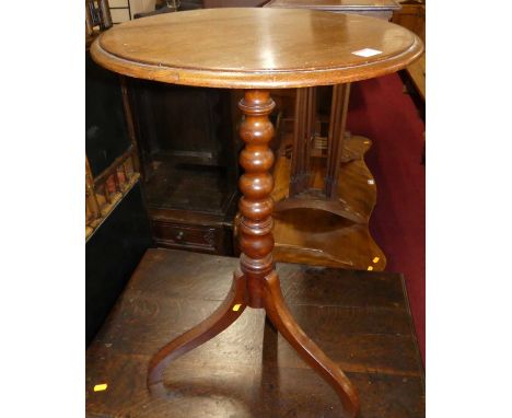 A Victorian mahogany pedestal tripod table on umbrella legs, dia. 46cm