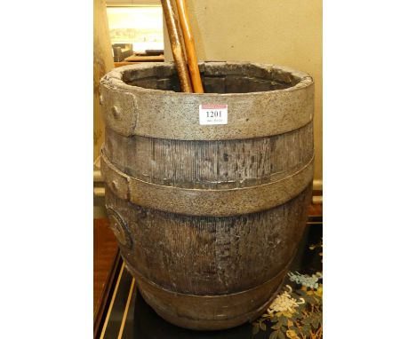 A coopered oak barrel, h.43cm; together with an antler topped walking stick; and one other (2)