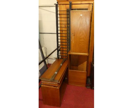 A Ladderax teak and metal twin section lounge unit, comprising two cupboards, open shelf, and adjustable shelves