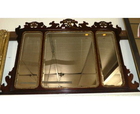 After Chippendale - a mahogany and parcel-gilt overmantel mirror, having triple bevelled plates, 85 x 122cm 