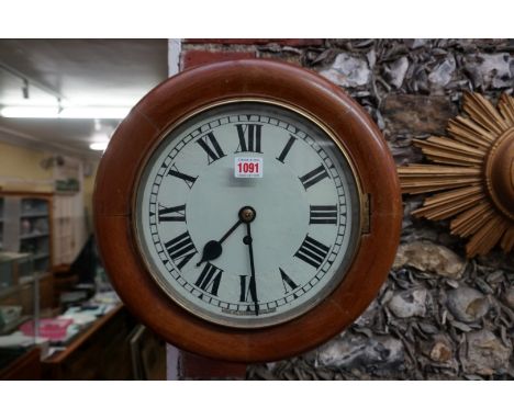 An antique mahogany circular wall clock,&nbsp;inscribed 'Tameside', 36.5cm diameter, with pendulum, (chapter ring re-painted)