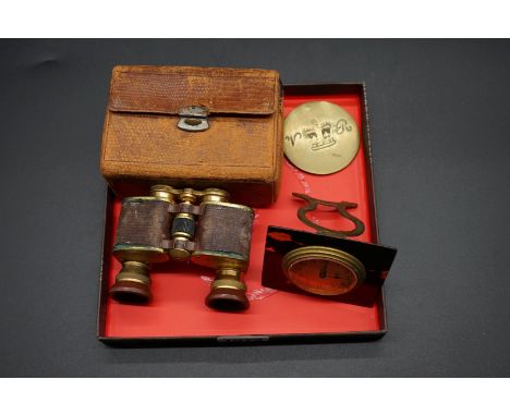 A vintage tortoiseshell and gilt brass easel back timepiece,&nbsp;7cm high; together with a cased pair of lizard and gilt bra