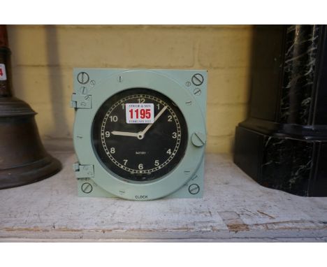 A quartz frigate clock,&nbsp;inscribed 'Unit Type 66', 15cm wide. 